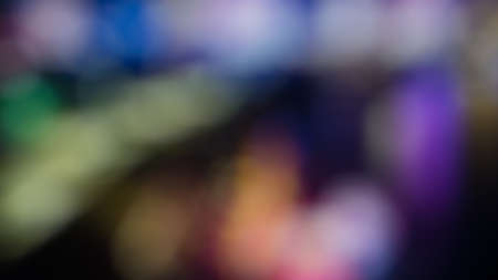 Atmospheric abstract background, city lights at night blur. Background with bokeh defocused lights...