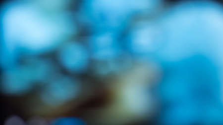Atmospheric abstract background, city lights at night blur. Background with bokeh defocused lights and shadowの写真素材