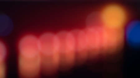 Atmospheric abstract background, city lights at night blur. Background with bokeh defocused lights...