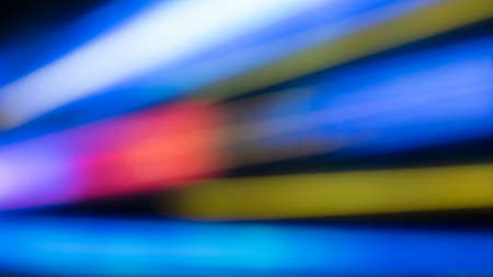 Atmospheric abstract background, city lights at night blur. Background with bokeh defocused lights and shadowの写真素材