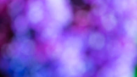 Atmospheric abstract colorful background, city lights at night blur. Background with bokeh defocused...