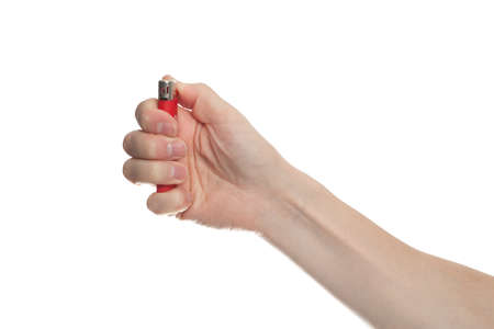 red lighter in male hand isolated on white backgroundの写真素材