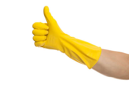 yellow glove for cleaning on arm show thumbs upの写真素材
