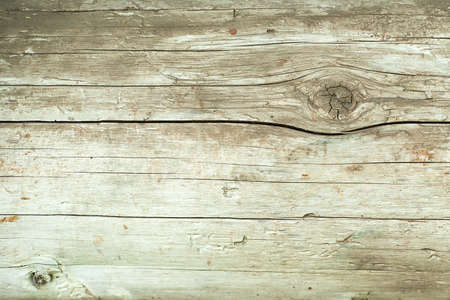 Grunge background. Peeling paint on an old wooden floor. Vintage wood background. Old wood textureの写真素材