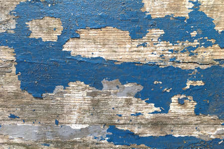 Grunge background. Peeling paint on an old wooden floor. Vintage wood background. Old wood textureの写真素材