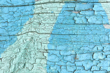Grunge background. Peeling paint on an old wooden floor. Vintage wood background. Old wood textureの写真素材