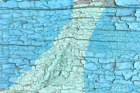 Grunge background. Peeling paint on an old wooden floor. Vintage wood background. Old wood textureの写真素材