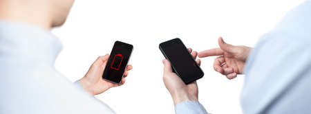 Close up man hands using smart phone battery low charged battery screen. White background