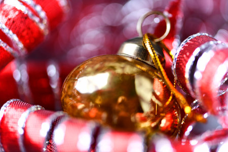 Christmas decoration on the background of red ribbons. Shallow depth of field.の写真素材