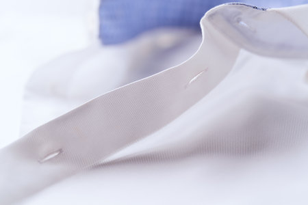 Close-up of a white shirt. Shallow depth of field.の写真素材