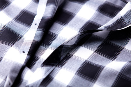 close up of a checkered shirt with black and white stripesの写真素材