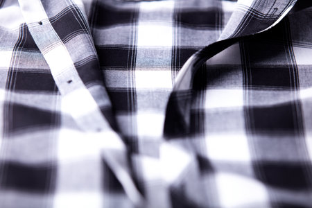 Close up of a checkered shirt. Selective focus. Toned.の写真素材