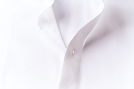 white silk fabric texture background close-up, soft focus, shallow DOFの写真素材