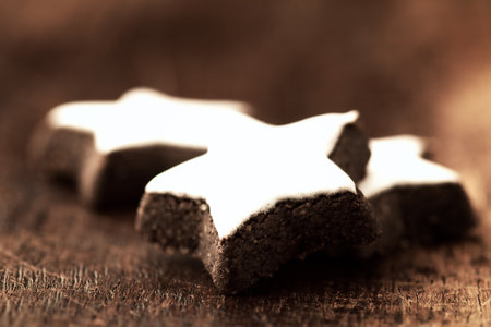 Christmas cookies on wooden background, shallow depth of field, selective focusの写真素材