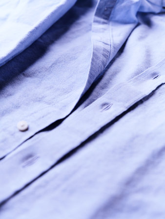 Close up of a blue shirt. Shallow depth of field.の写真素材