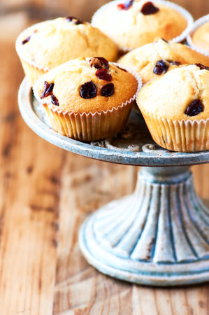 Homemade muffins with raisins and cranberries, selective focusの写真素材