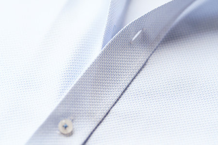 Close up of white men's shirt. Shallow DOF.