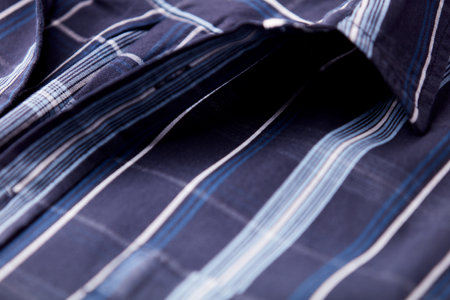 Close up of men's shirt with blue stripes. Selective focus.の写真素材
