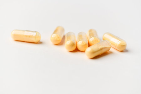 Capsules of omega 3 fish oil on a white background.の写真素材