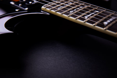 Electric guitar on a black background. Close up. Selective focus.の写真素材