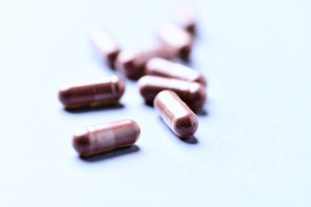 Pills on a blue background. Selective focus. Shallow depth of field.
