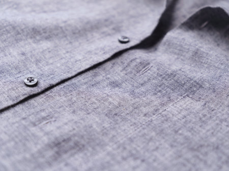 Close up of men's linen shirt. Soft focus.
