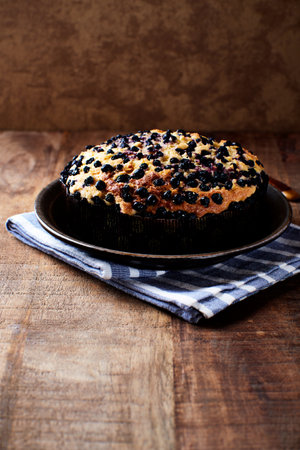 Blueberry cake in a rustic style. Selective focus.