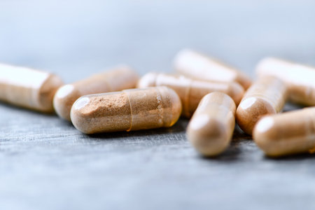 Capsules of omega 3 on a wooden background. Selective focus.の写真素材