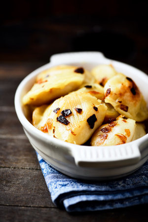 Cottage cheese dumplings with raisins, selective focusの写真素材