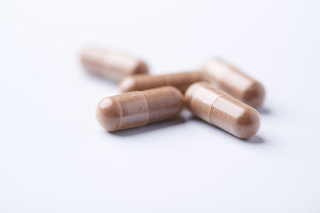 Medicine pills isolated on white background. Selective focus and shallow depth of field.