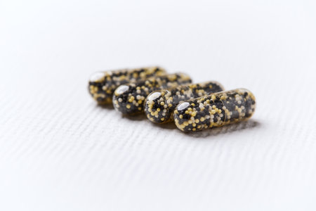 Capsules of omega 3 fish oil on a white background.の写真素材