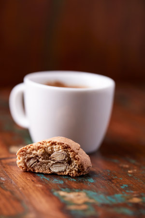 Cup of tea and cookies on a wooden background. Selective focus.の写真素材