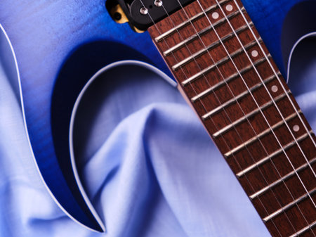 Fretboard of modern electric guitar. Soft focus. Close up. Copy space.の写真素材