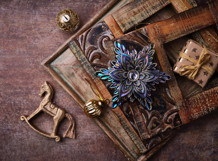 Vintage background with old books and christmas decorations. Top viewの写真素材