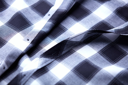 Close up of checkered shirt. Selective focus. Toned.の写真素材