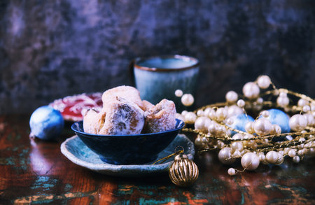 Traditional christmas cookies in a bowl on a wooden background. Soft focus.の写真素材