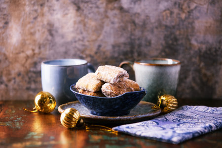 Traditional christmas cookies with gingerbread in a bowl on a wooden background. Soft focus.