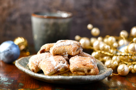 Traditional christmas cookies in on rustic wooden background. Soft focus.の写真素材
