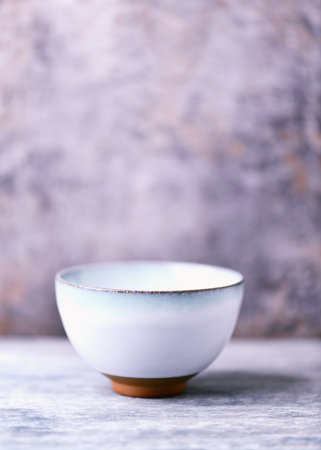 Traditional japanese ceramic on rustic wooden background. Soft focus. Copy space.の写真素材