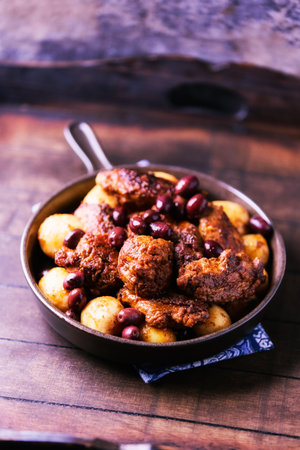 Fried chicken wings on a rustic background.の写真素材