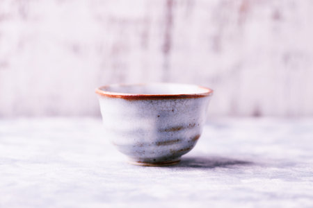 Porcelain bowl on a white background. Selective focus.の写真素材