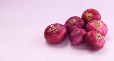 red onions path isolated on white with copy spaceの写真素材