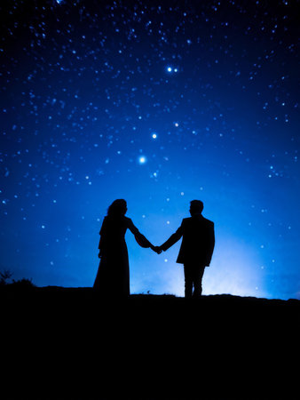 silhouettes of young couple in love on the moon backgroundの素材