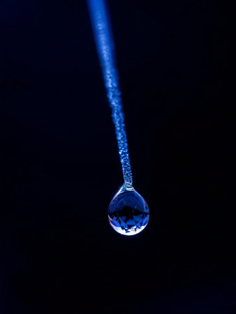 drops of water on the black glassの素材