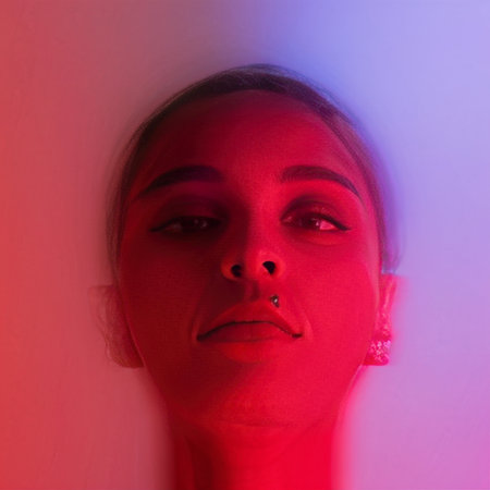 portrait of young woman with neon lights lightの素材