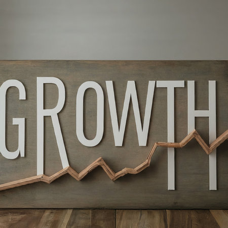 wooden blocks with word growing on the white backgroundの素材