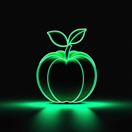 green apple isolated on black background. glowing light bulbの素材