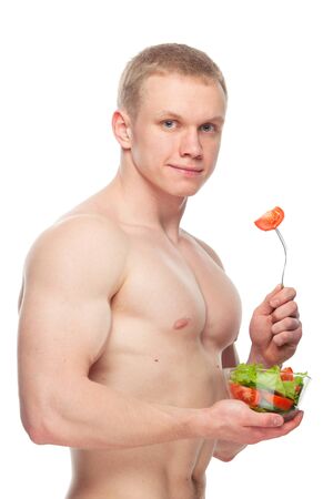 ShapShaped and healthy body man holding a fresh salad bowl,shaped abdominal, isolated on white background, colored retouched,  toplessed and healthy body man holding a fresh salad bowl,shaped abdominal, isolated on white background, colored retouched, topの写真素材