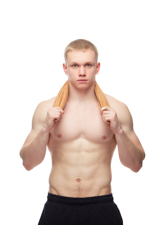 handsome  muscular man with towelの写真素材