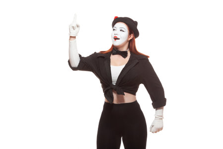 Portrait of a female mime artist performing, isolated on white background. Symbol of an idea, insight, Eurekaの写真素材